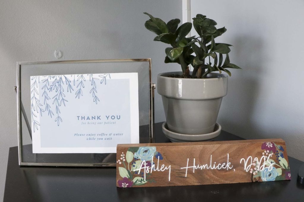 Lobby decor including a thank you for being our patient sign at Humlicek Family Dental